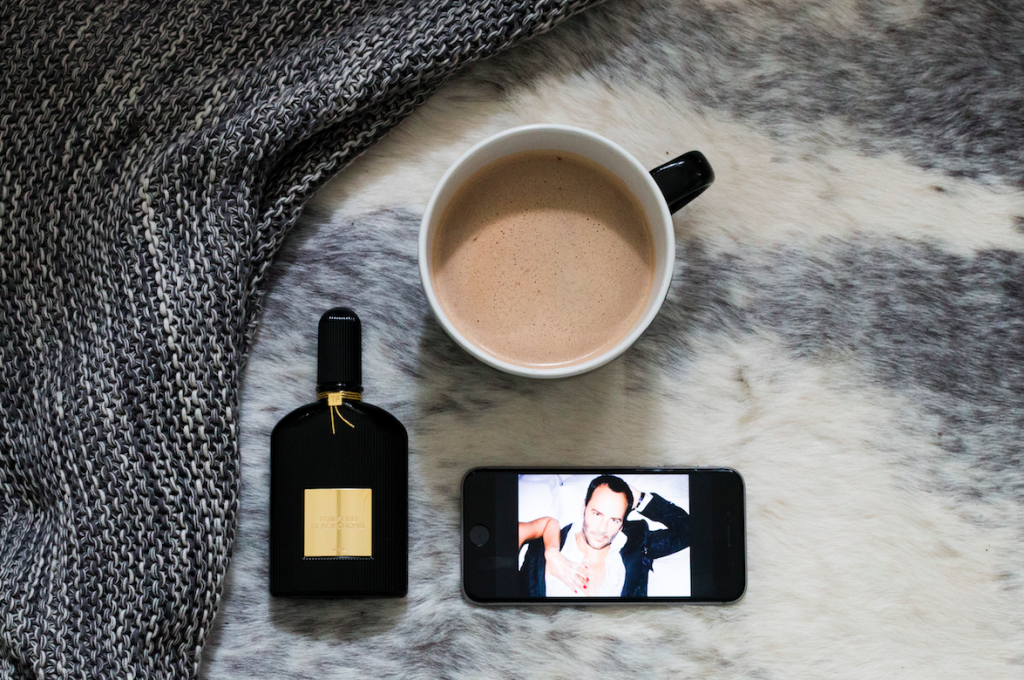 Perfume and coffee on a faux fur rug